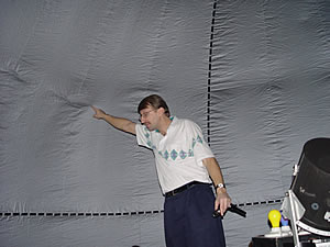 Mr. K. explaining how the dome works to a group of students.